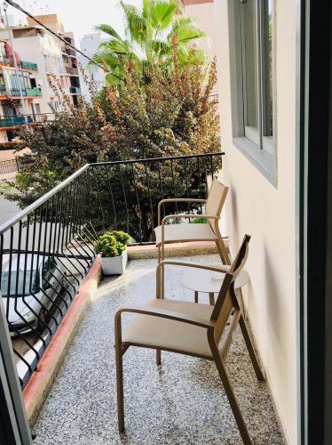 Private balcony overlooking the street at Hostal Pitiusa Ibiza